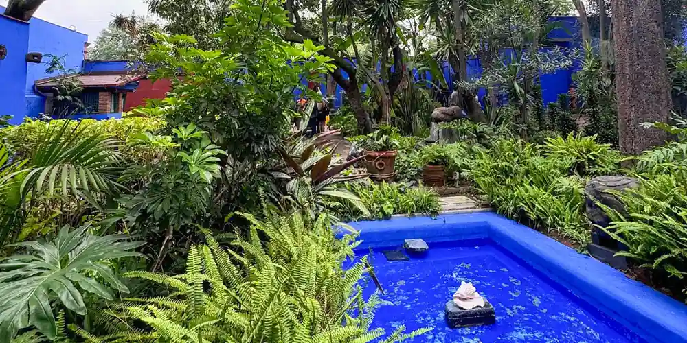 Garden and reflecting pool at Casa Azul, the Frida Kahlo Museum in Coyoacán