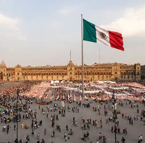 The Zócalo, National Palace, and giant Mexican flag in Mexico City
